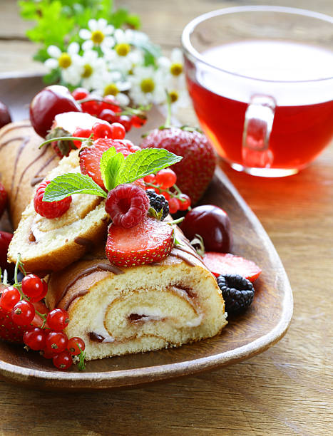 istock biscuit roulade with butter cream and fresh berries 479184974