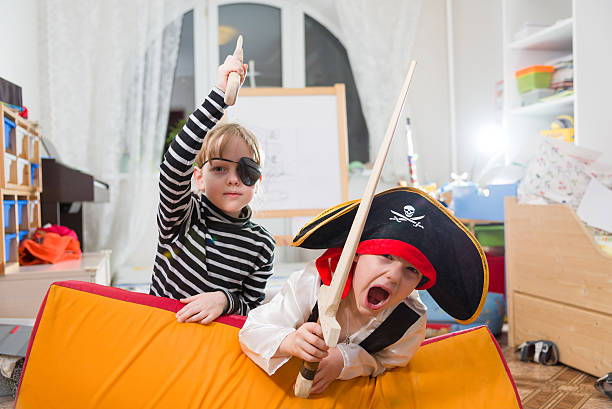 children play pirates stock photo
