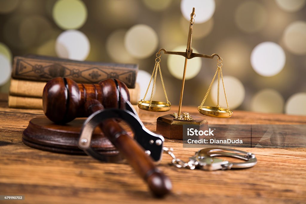 Golden scales of justice, books. Statue of Lady Justice. Owl 2015 Stock Photo