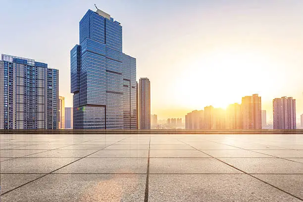 Photo of Empty floor and modern building with sunbeam