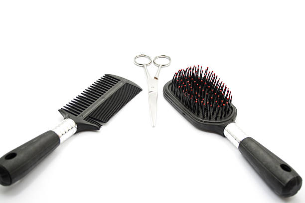 istock Different Hairbrush with Hair Scissors on white background 479193077