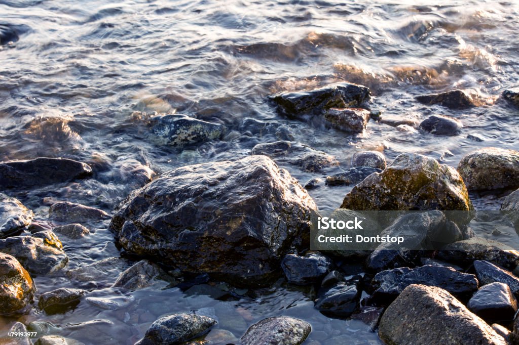 Wave Wave with rocks Basalt Stock Photo