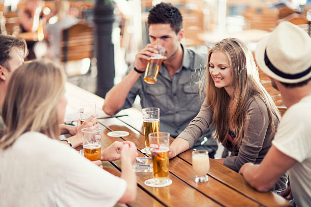 istock Young people drinking beer outdoors 479194514