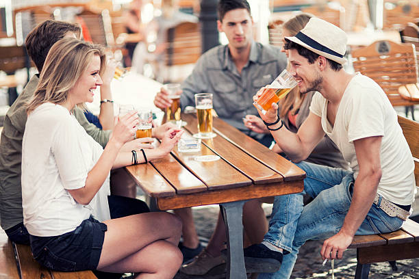 istock Young people drinking beer outdoors 479194518