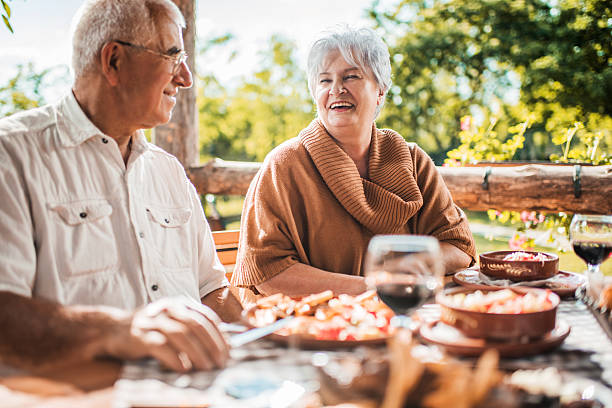 istock Happy senior couple communicating during lunch in a restaurant. 479195122