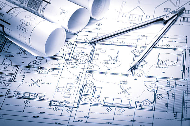 Construction planning drawings Architecture concept with  drawing compass on blueprints. 2015 stock pictures, royalty-free photos & images
