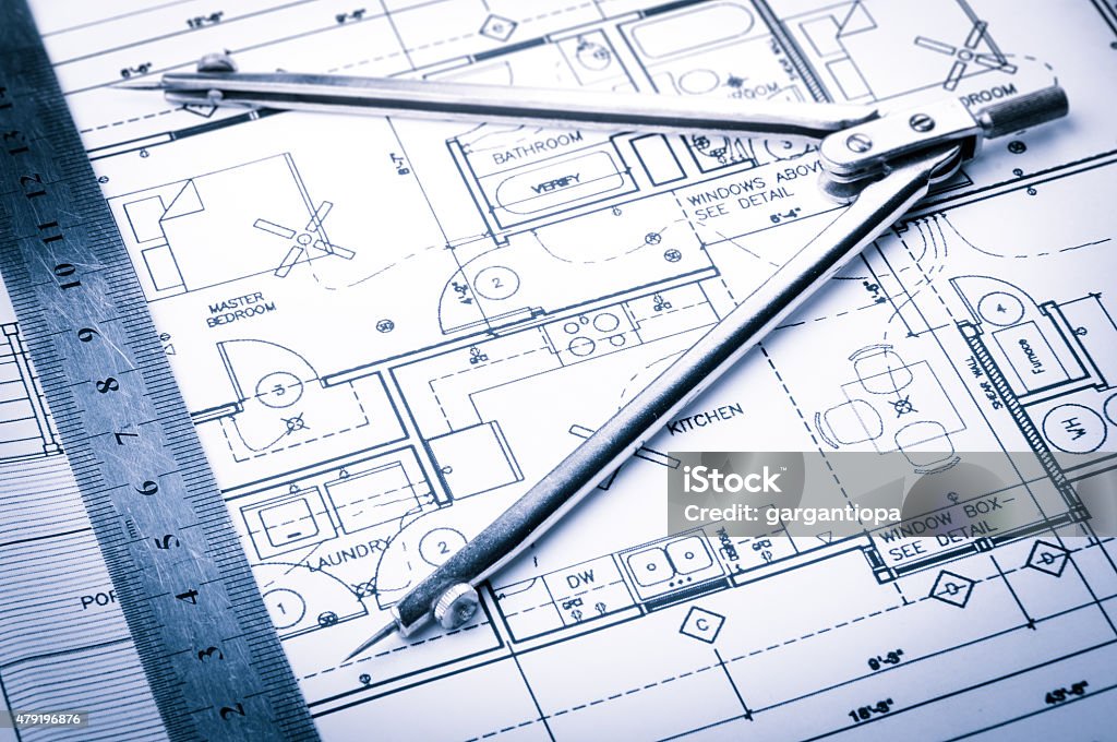 Construction planning drawings Architecture concept with ruler and drawing compass on blueprints. 2015 Stock Photo