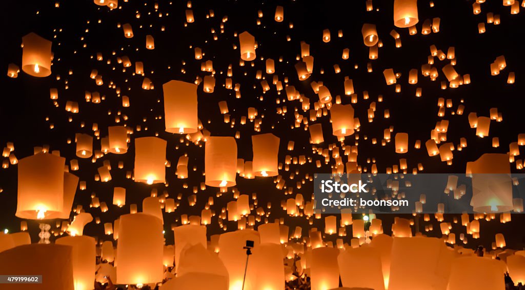 Sky lanterns festival or Yi Peng festival in Thailand Floating lanterns ceremony or Yeepeng ceremony, traditional Lanna Buddhist ceremony in Chiang Mai, Thailand Paper Lantern Stock Photo
