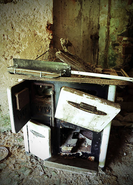 istock wood stove of old kitchen in an abandoned house 479199708