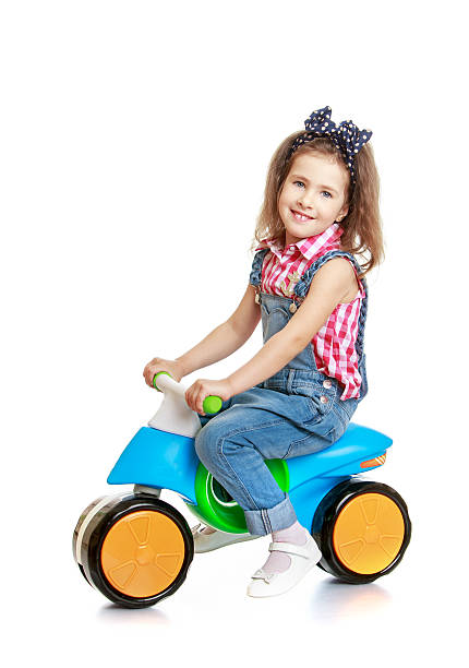 istock Little girl riding her bike 479200094