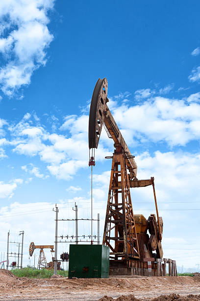 istock oil field and blue sky 479200690