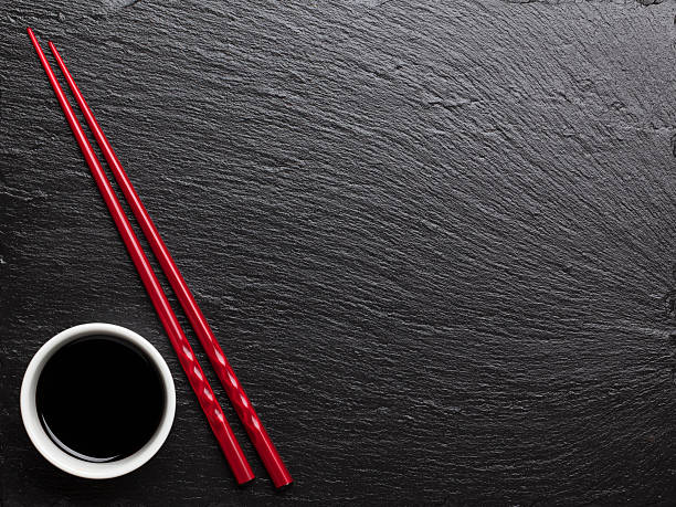 istock Japanese sushi chopsticks over soy sauce bowl 479202364
