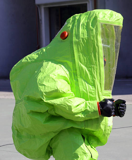 istock yellow protective suit to work in presence of asbestos 479202676