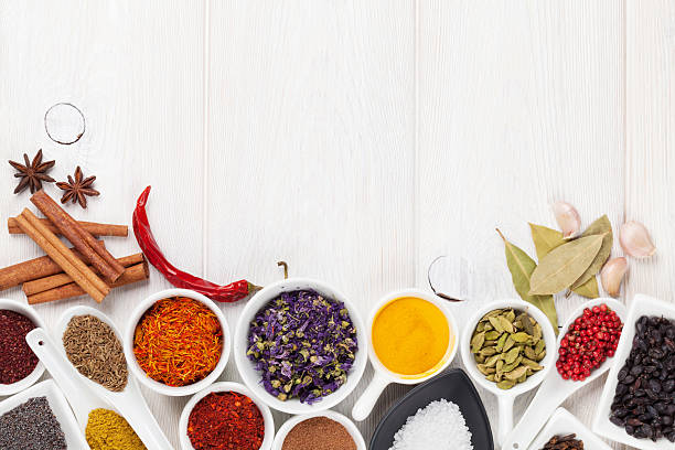 istock Various spices on white wooden background 479203896