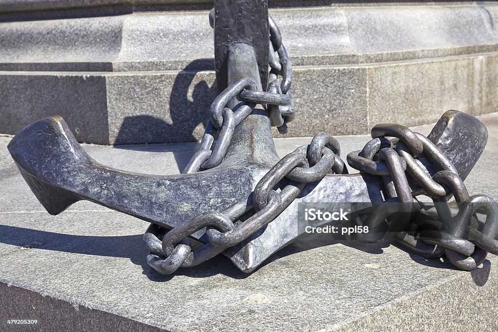 Anchor near a monument to the admiral Nakhimov Fragment of pedestal of ancient monument to the admiral Nakhimov Admiral Stock Photo