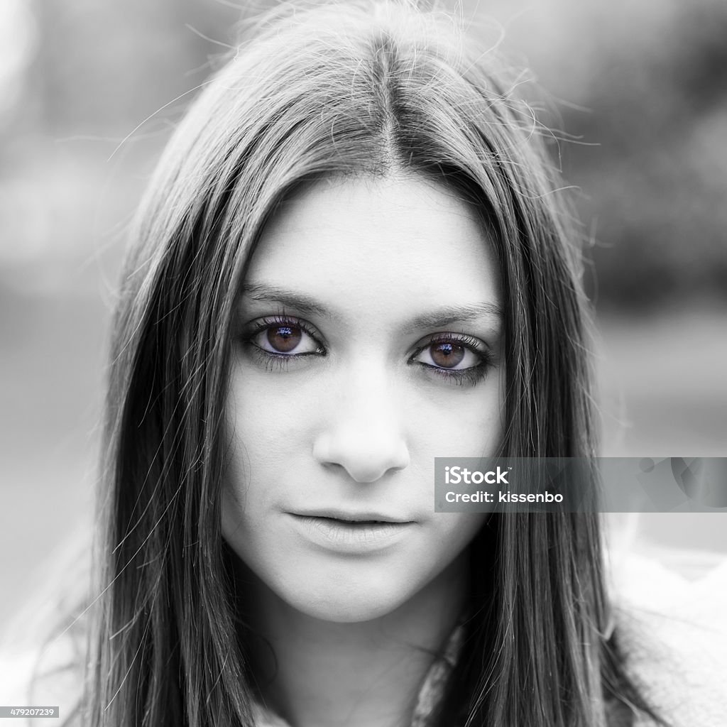 Black and withe closeup  portrait of attractive girl, outdoor. Black and withe portrait of young woman closeup. Adult Stock Photo
