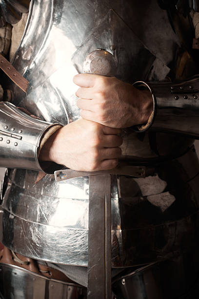 istock knight wearing armor and holding two-handed sword 479207290