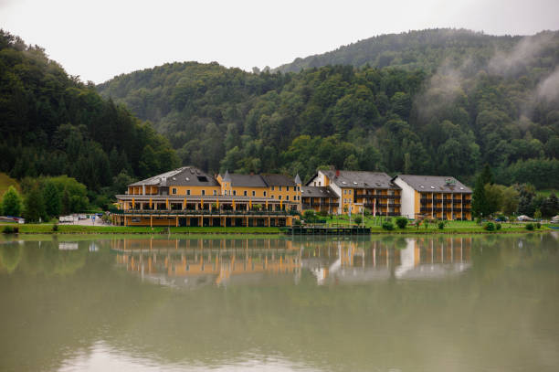 hotel buildings by danube river near grein austria grein, austria - August 25, 2012: Traditional hotel buildings is located by danube river near grein city of austria grein austria stock pictures, royalty-free photos & images