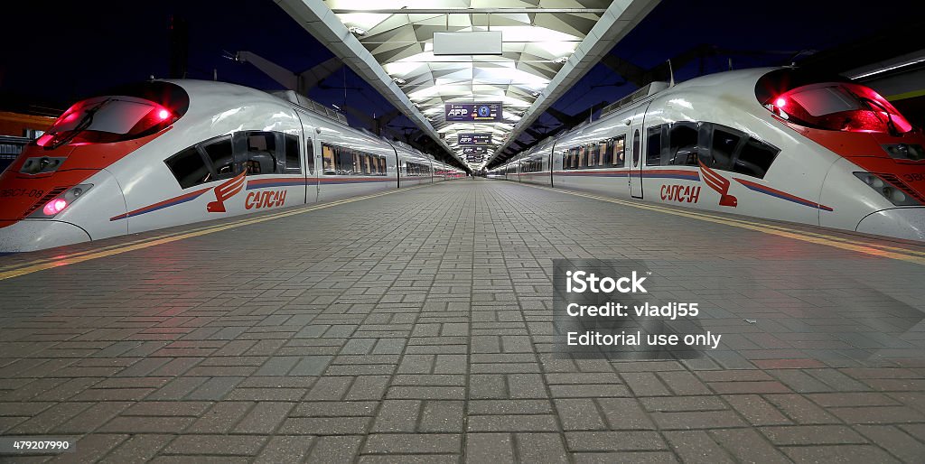 Aeroexpress Train Sapsan at the Leningrad station (night). Moscow, Russia Moscow, Russia - June 5, 2015: Aeroexpress Train Sapsan at the Leningrad station (night). Moscow, Russia -- high-speed train acquired OAO "Russian Railways" for use on the Russian high-speed railways Peregrine Falcon Stock Photo