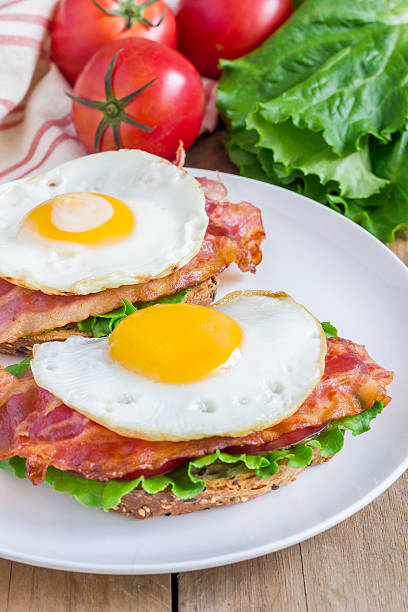 istock Open face sandwich with egg, bacon, tomato and lettuce 479208672