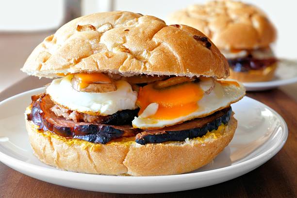 istock Breakfast sandwich with eggs, ham, mushrooms and cheese 479208762
