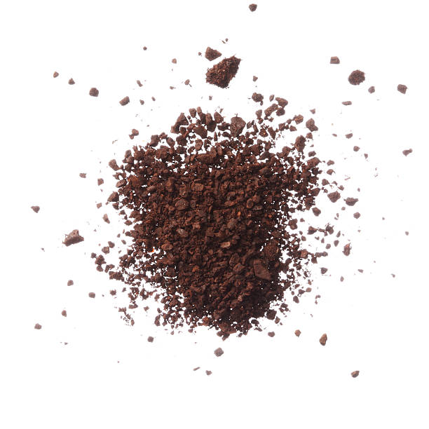 istock Ground coffee pile isolated on white background overhead view 479209605