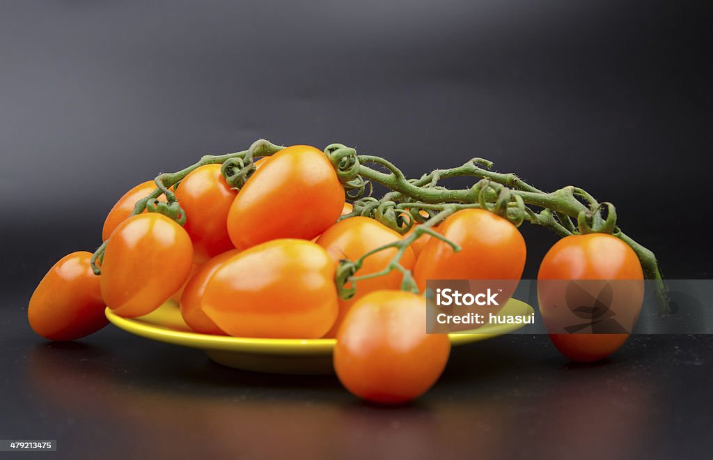 Variedad de frutas y verduras ： amarillo tomate cereza. - Foto de stock de Alimento libre de derechos