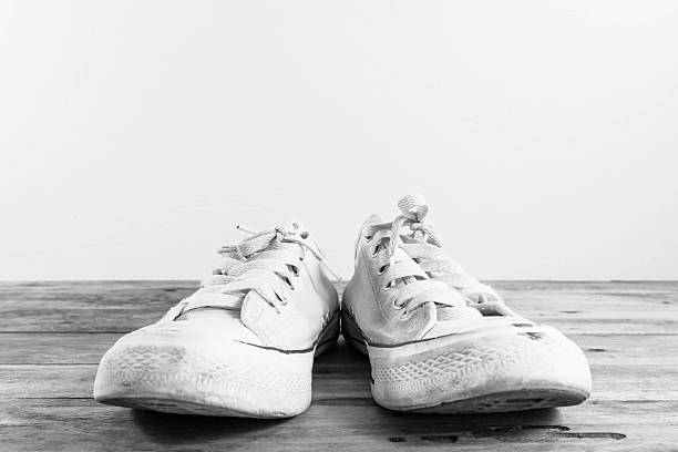 istock sneakers on the wooden 479213616