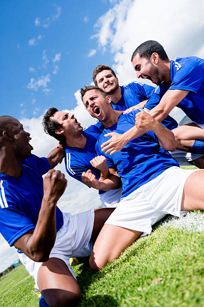 istock Football team celebrating a goal 479214947