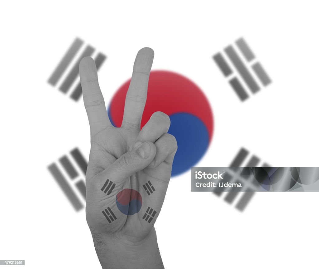Hand peace sign with flag of South Korea Hand peace sign, wrapped in the flag of South Korea Asia Stock Photo
