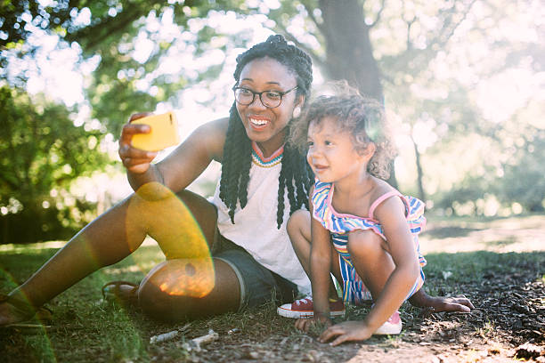 istock Mom and Daughter Take a Selfie 479216468