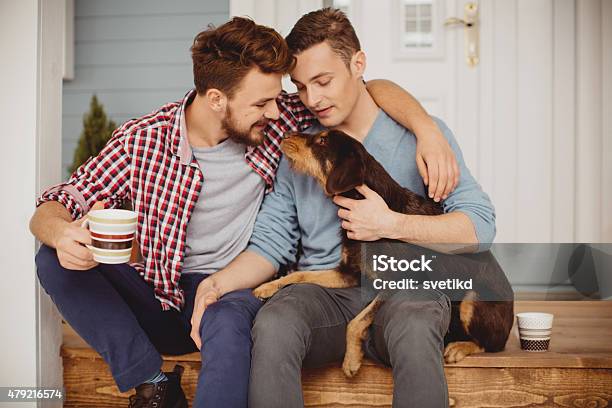 Young Gay Couple Stock Photo - Download Image Now - Dog, Gay Couple, Couple - Relationship