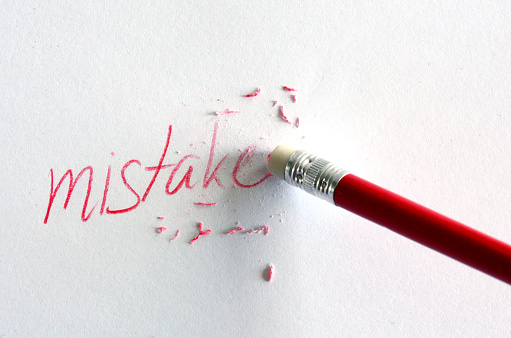 red pencil erasing a mistake