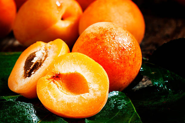istock Ripe tasty apricot with leaves 479218094