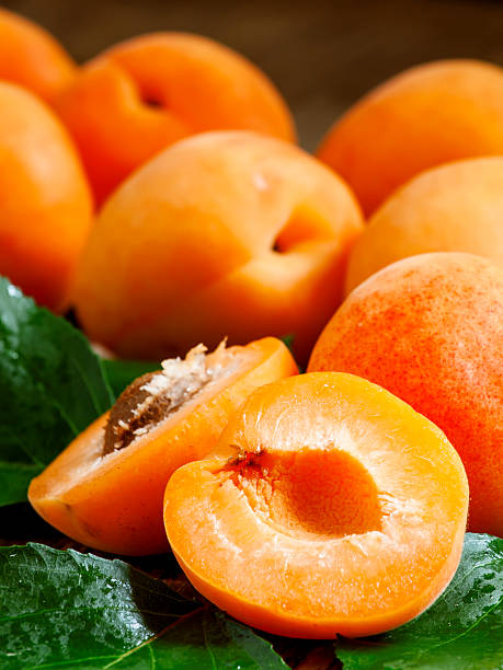istock Ripe tasty apricot with leaves 479218166