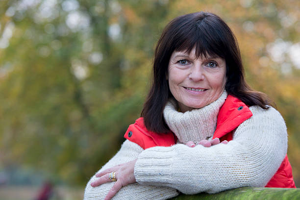 istock Happy Mature Woman in the Woods 479218372