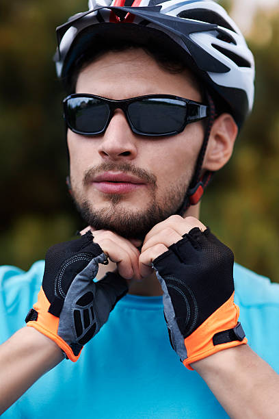 istock Cyclist wearing his sports helmet 479219008