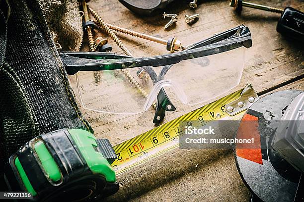 Different Tools On A Wooden Background Stock Photo - Download Image Now - 2015, Activity, Anaerobic Exercise