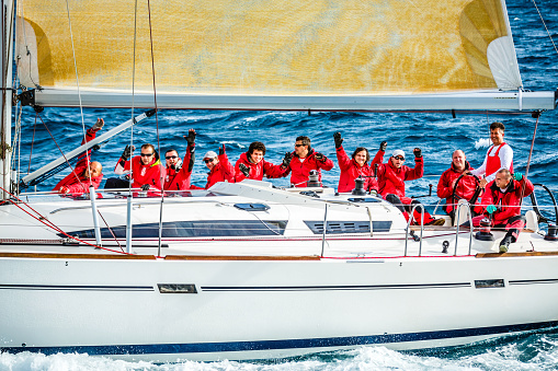 Sailing crew on sailboat during regatta. http://santoriniphoto.com/Template-Sailing.jpg