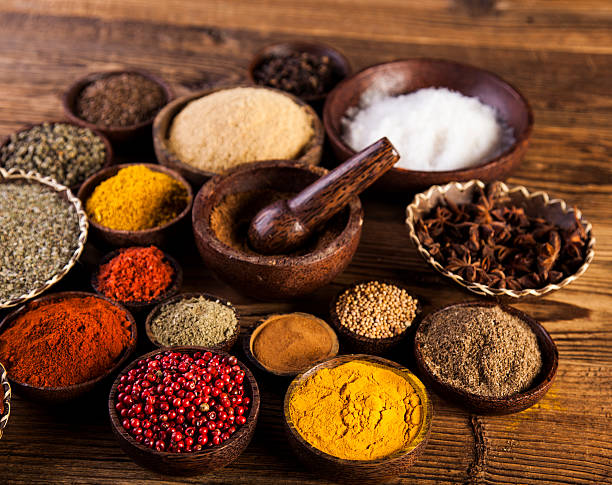 istock Spices and herbs in wooden bowls. 479224102
