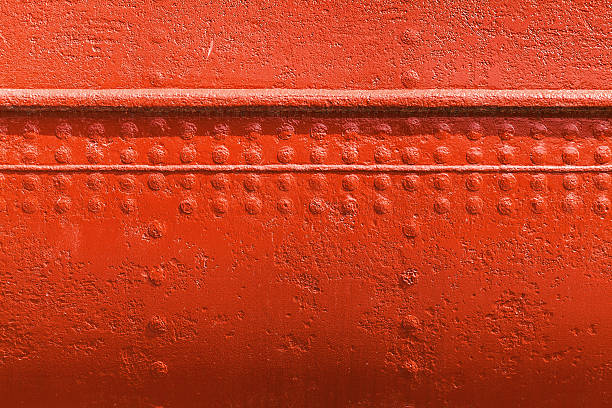 Old ships hull texture, red metal wall texture with seams and rivets