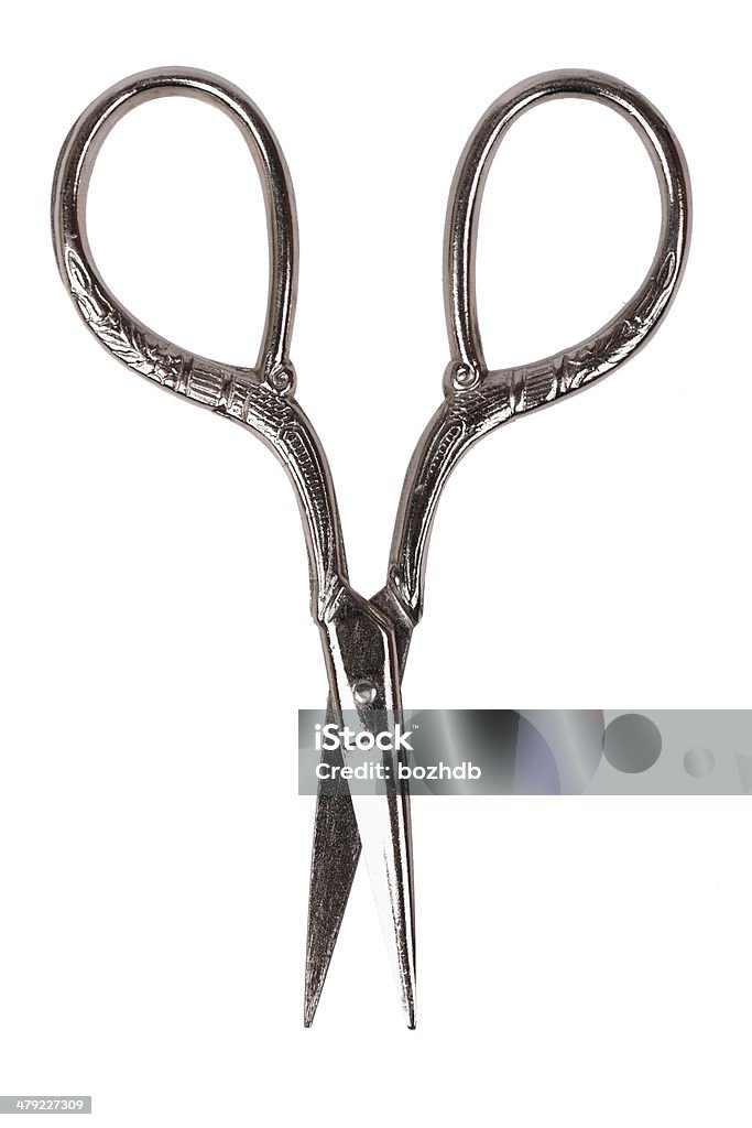 Vintage scissors at white background Vintage little scissors isolated on white background Antique Stock Photo