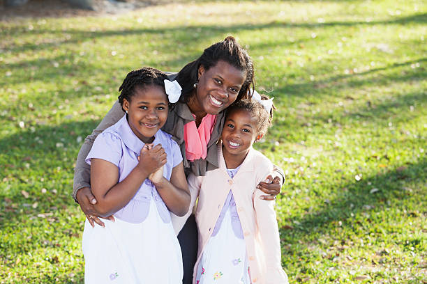 istock African American mother and daughters 479231153