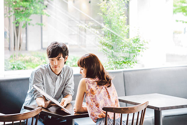 istock Young couple looking at menu in cafe. 479231164