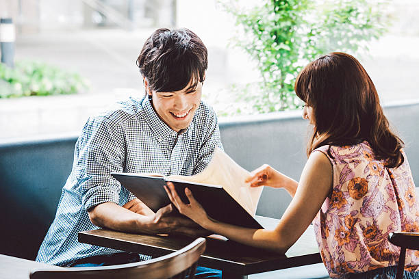 istock Young couple looking at menu in cafe. 479231168