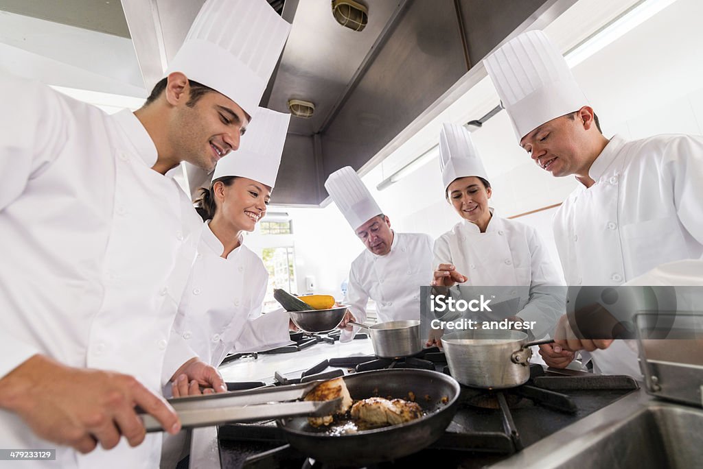 Menschen in einem Kochkurs - Lizenzfrei Kochberuf Stock-Foto