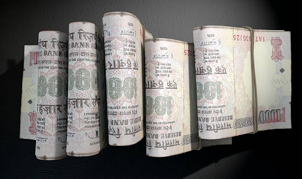 istock Wads Of Notes Pile Dark 479234520