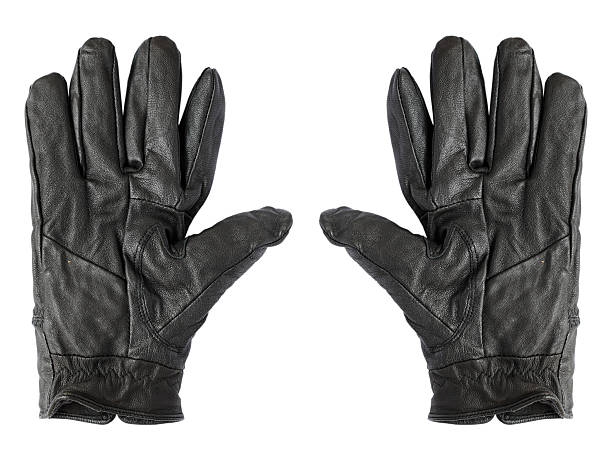 istock Black leather gloves isolated on white background 479234737