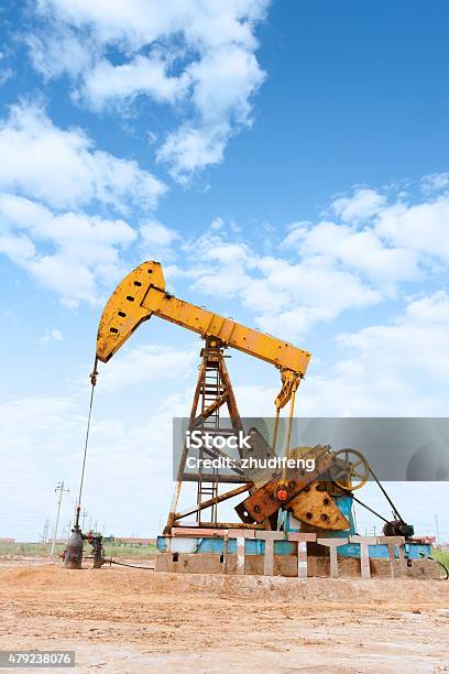 Oil Field And Blue Sky Stock Photo - Download Image Now - 2015, Agricultural Field, Air Valve