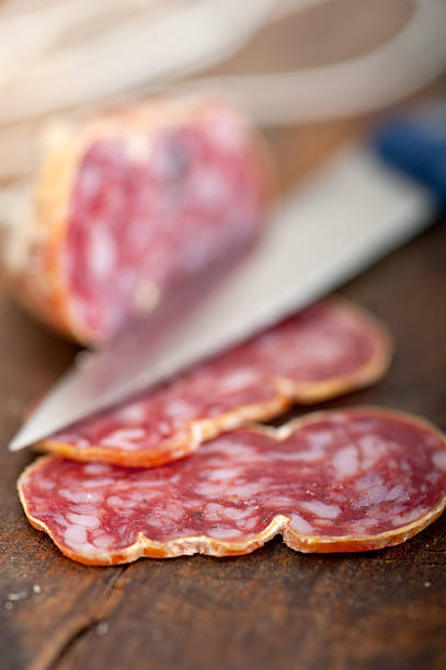istock italian salame pressato pressed slicing 479238439